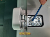 Adjusting the tilt of a uPVC door