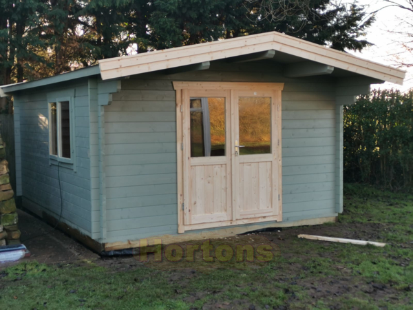 4x4m log cabin manufactured by Bertsch Holzbau_1