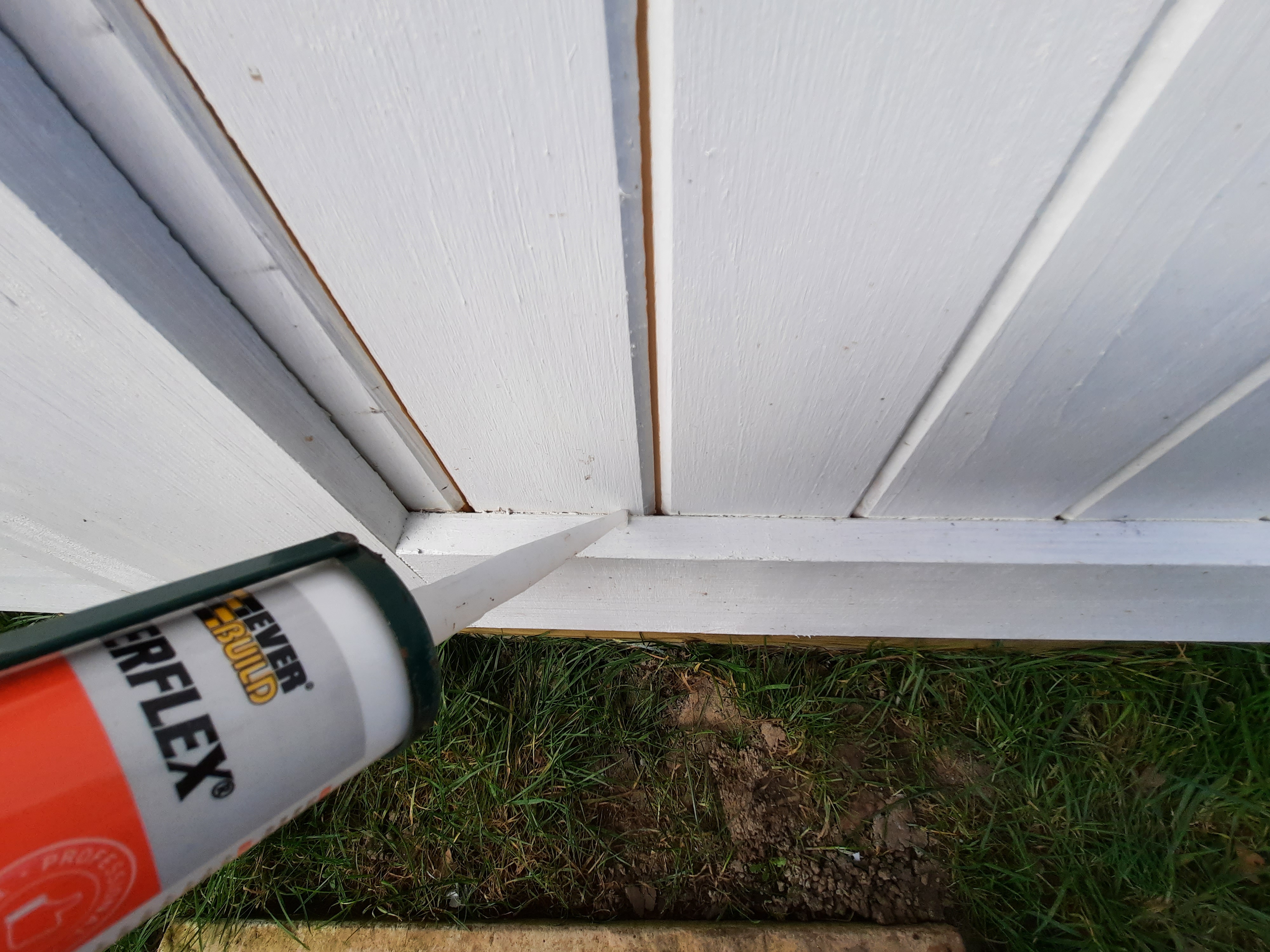 Painting a log cabin door