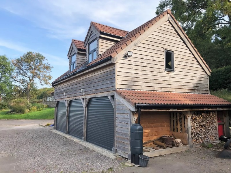 Raised Eaves room over post & beam garages - Click Image to Close