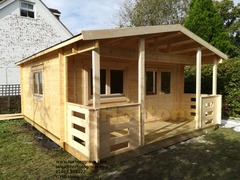 5x6.8m Log cabin including 1,8m deep veranda and roof canopy_1