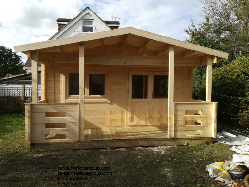 5x6.8m Log cabin including 1,8m deep veranda and roof canopy_2