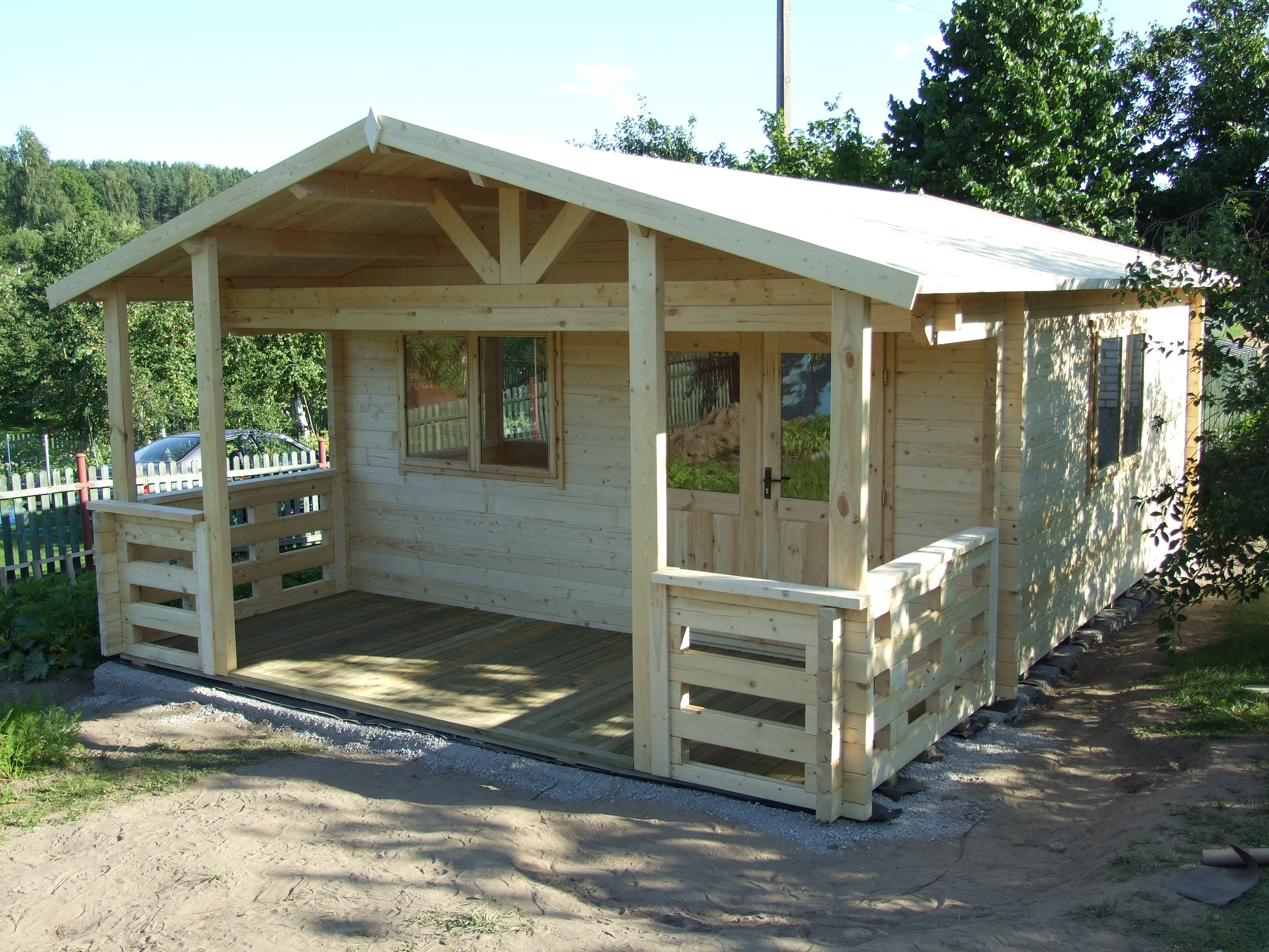 5m x 6.8m log cabin with large covered veranda_1