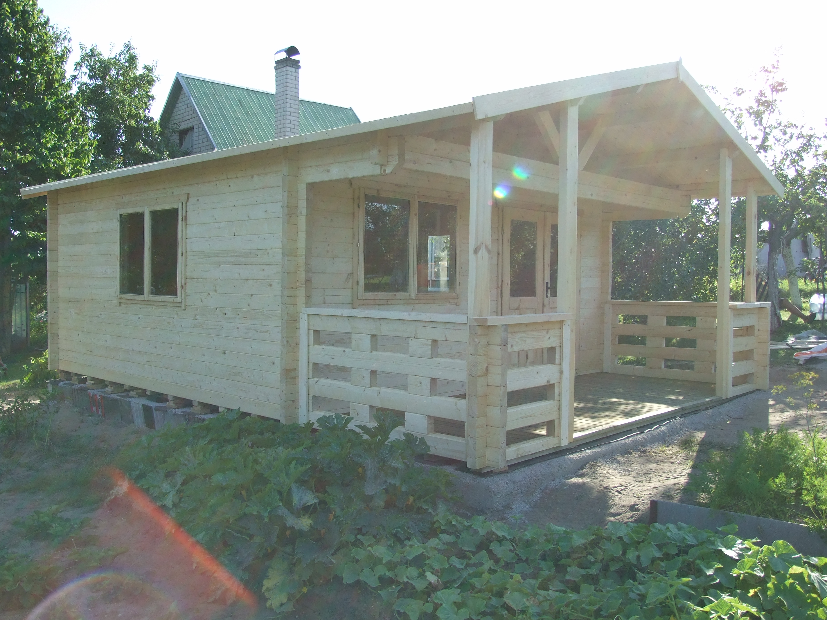 5m x 6.8m log cabin with large covered veranda_3
