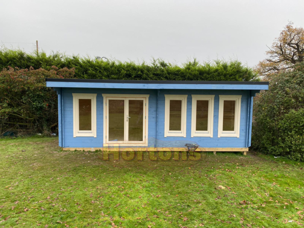 Insulated log cabin office