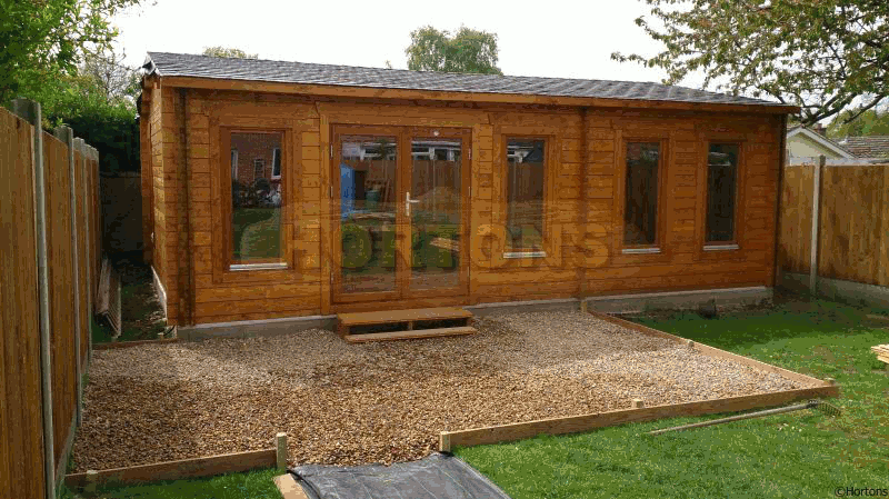 customer of Hortons building their log cabin