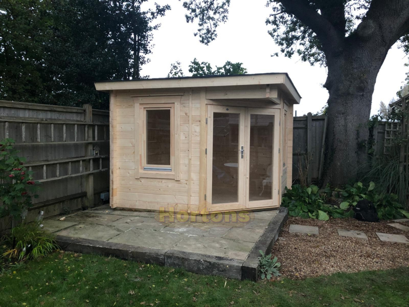 3m x 3m corner log cabin