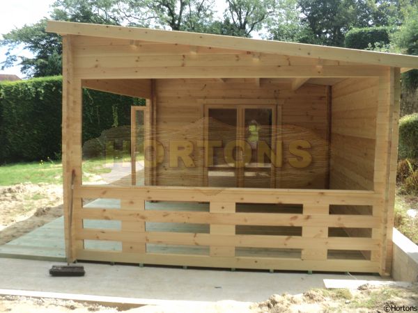 14.0 x 4.0m 60mm Twinskin Pent roof log cabin with barbecue area - Click Image to Close