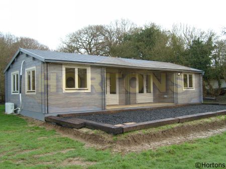 Insulated log cabins over 6m wide